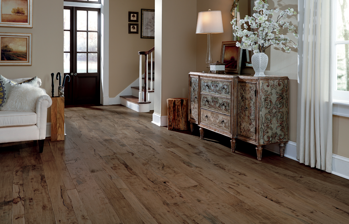 hardwood flooring in entryway living room area